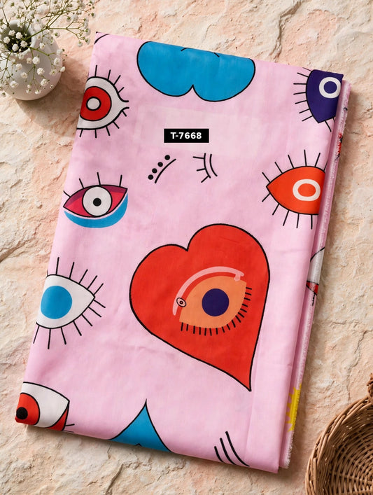 Wholesale T-7668 Heart-Evileye Print On Muslin Fabric - MUSLIN | The Wardrobe Fabrics