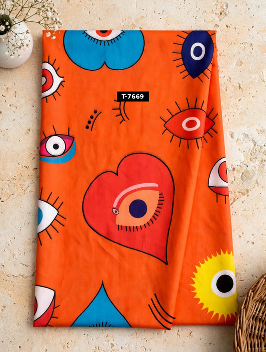 Wholesale T-7669 Heart-Evileye Print On Muslin Fabric - MUSLIN | The Wardrobe Fabrics
